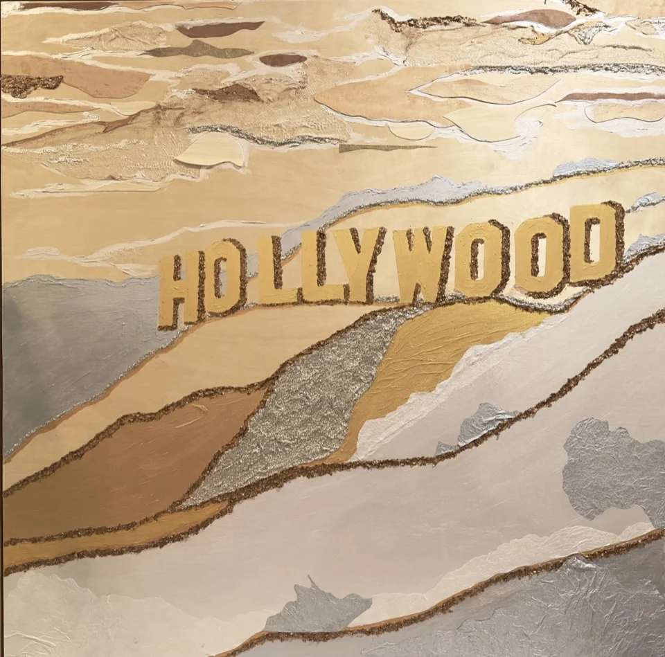 Textured mixed-media painting of the Hollywood sign in golds and neutrals